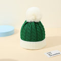Green and white cable knit christmas hat